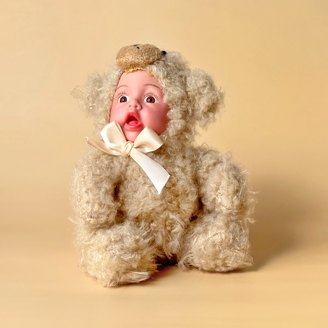 Curly Cream Baby Doll in Bear Suit