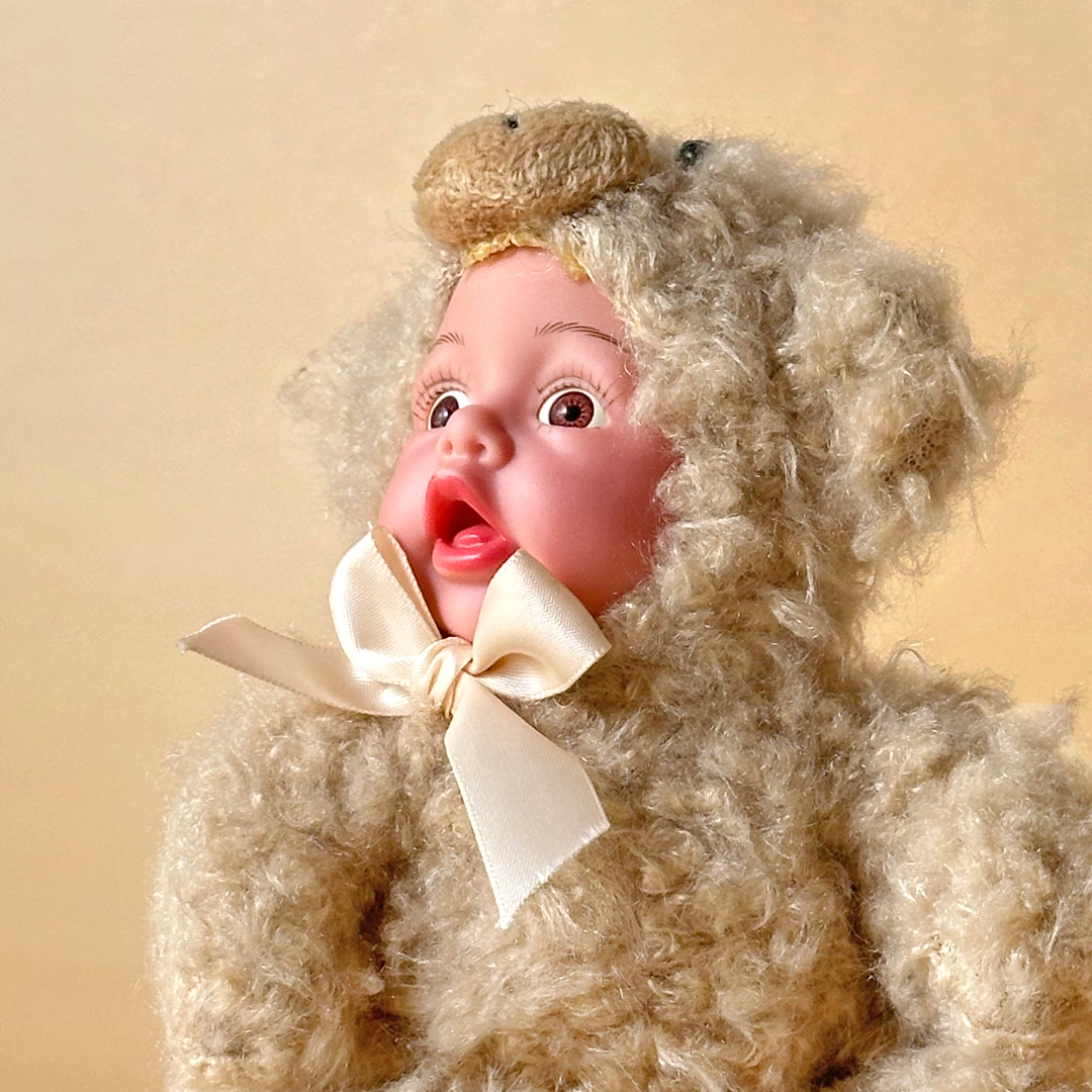 Curly Cream Baby Doll in Bear Suit