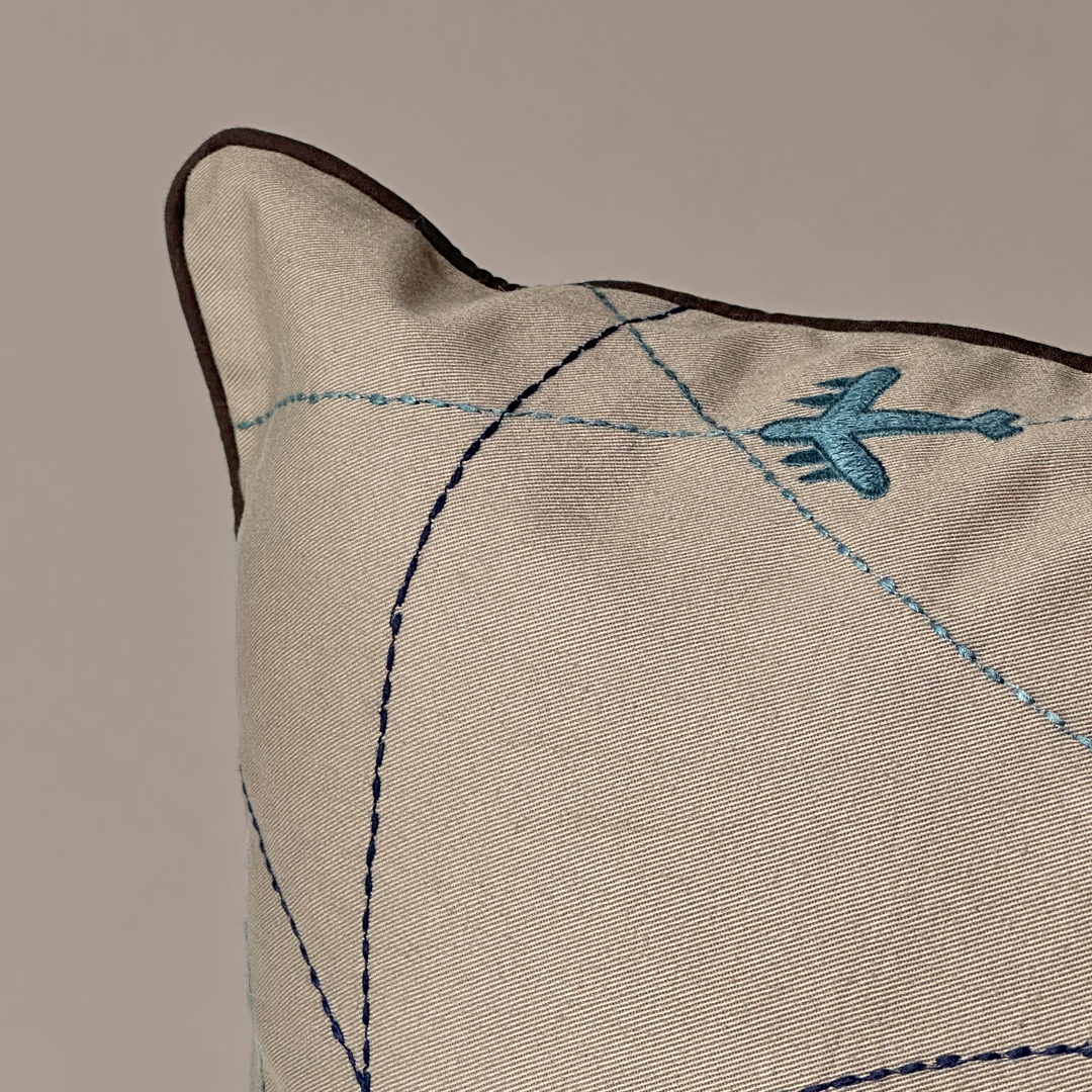Sky Trails Airplane Embroidered Cushion