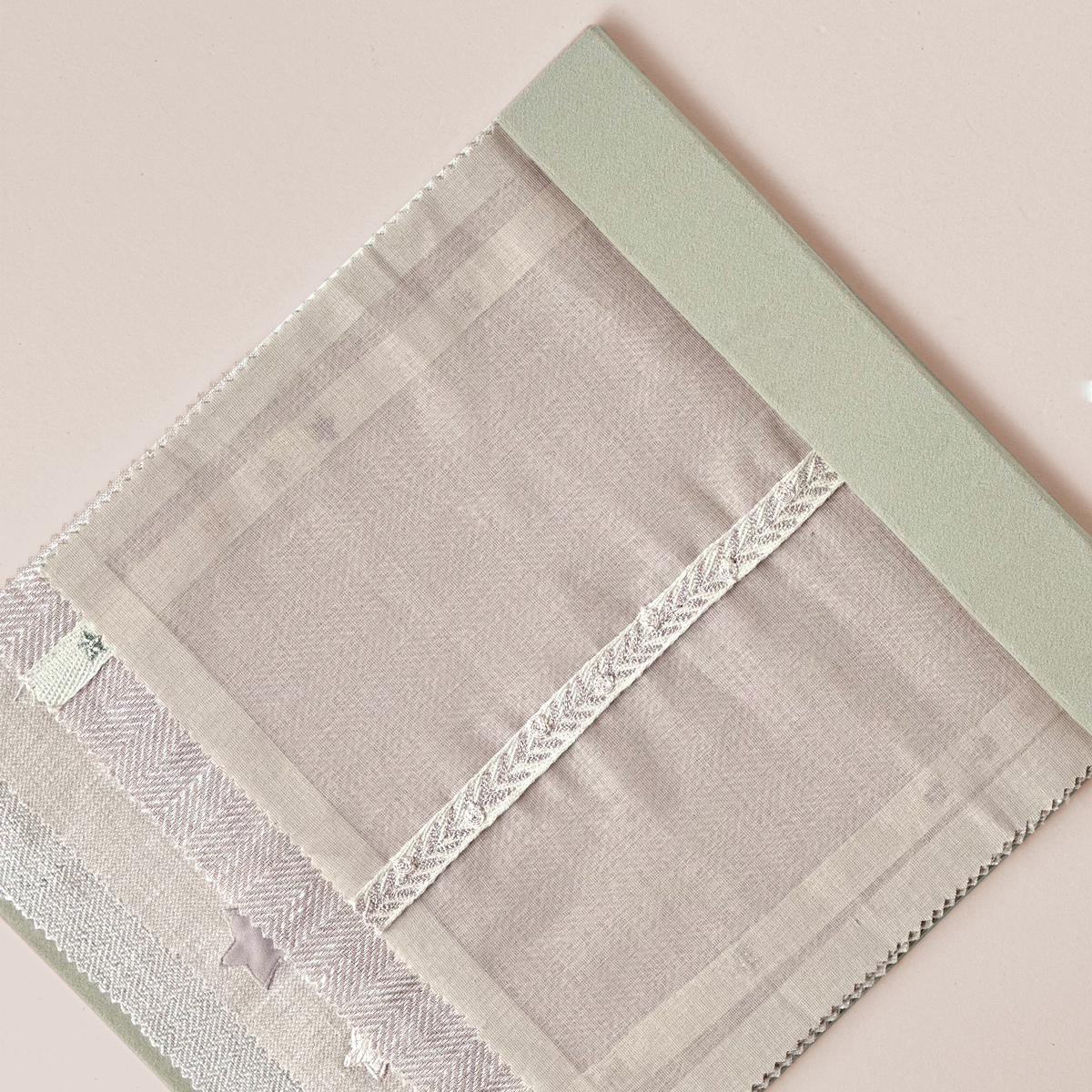Delicate Lace-Trimmed Textile